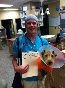 Phot of Phil Holds Me as Though I am His Veterinary Patient